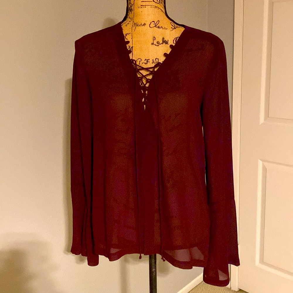 Leith sheer burgundy top with with bell sleeves.  Size small.